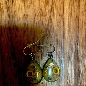 Handmade original earrings with clock pieces embedded in.